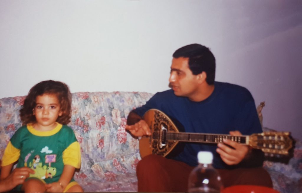 Yossi Aharon at the age of 3, taking a music lessons from the musician George Bar